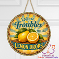 Where Troubles Melt Like Lemon Drops Door Sign