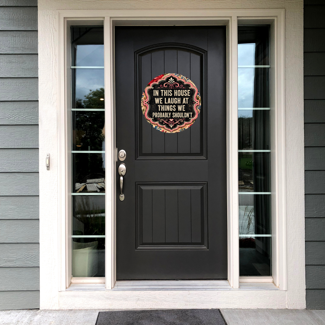 We Laugh at Things We Shouldn't Metal Door Sign